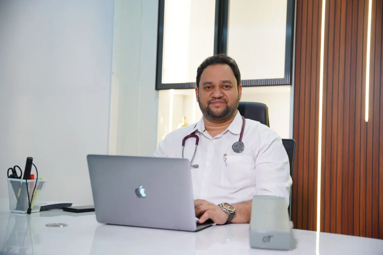 Dr. Kuladeep at his consultation desk